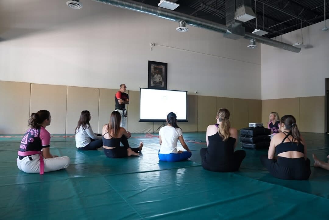 Seated instruction on the mats